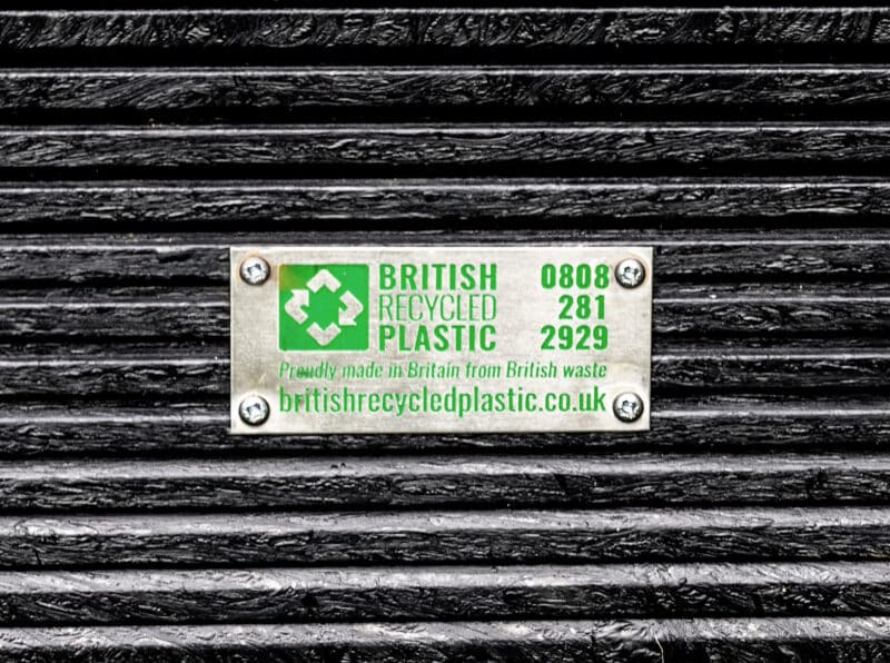 British Recycled Plastic plaque and detail of lumber on a raised bed