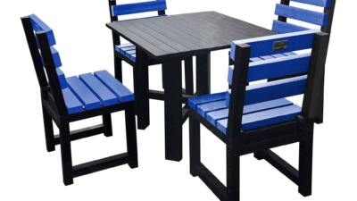 Black square garden table with four blue chairs made from recycled plastic.