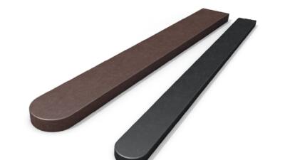 Cut-out of brown and black recycled plastic curved top fence posts