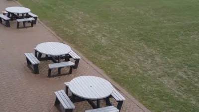 Calder picnic tables by football pitch at a school. British-Recycled-Plastic-