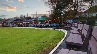 brown recycled plastic benches at a sports club