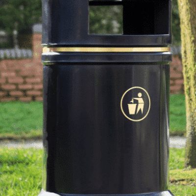 British Recycled Plastic black bin with gold sign, in a. park