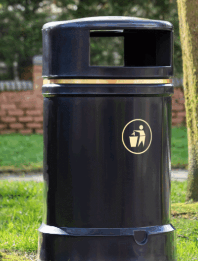 British Recycled Plastic black bin with gold sign, in a. park