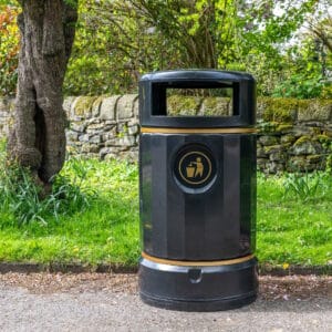 black and gold recycle plastic bin on the street