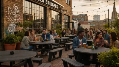 Busy terrace with people enjoying drinks at a recycled plastic picnic table