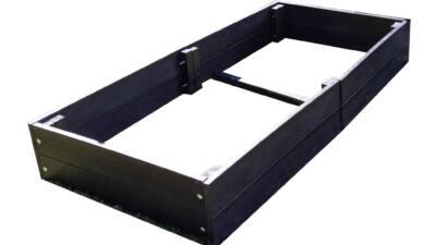 a British recycled Plastic artificial lumber raised bed that has just been assembled