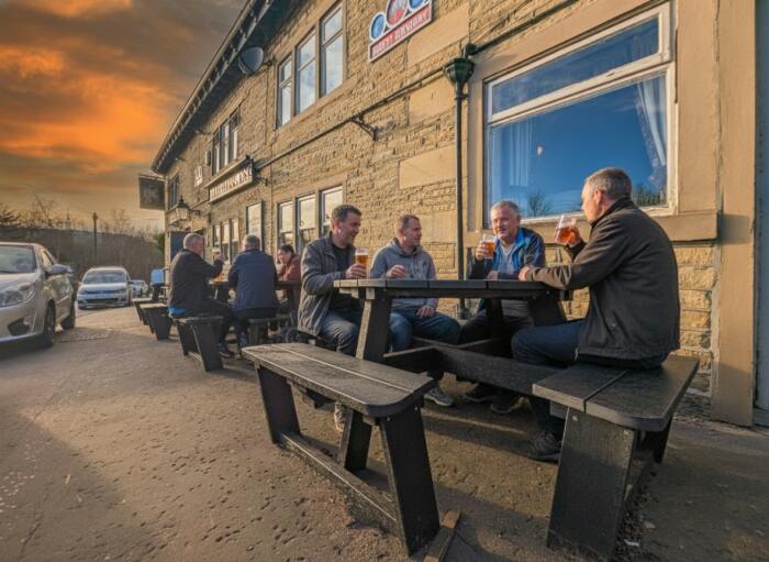 picnic-table-Calder-black-men-drinking-beer-outside-pub (1) Men enjoying drinks outside a pub on a British Recyled Plastic Calder picnic table