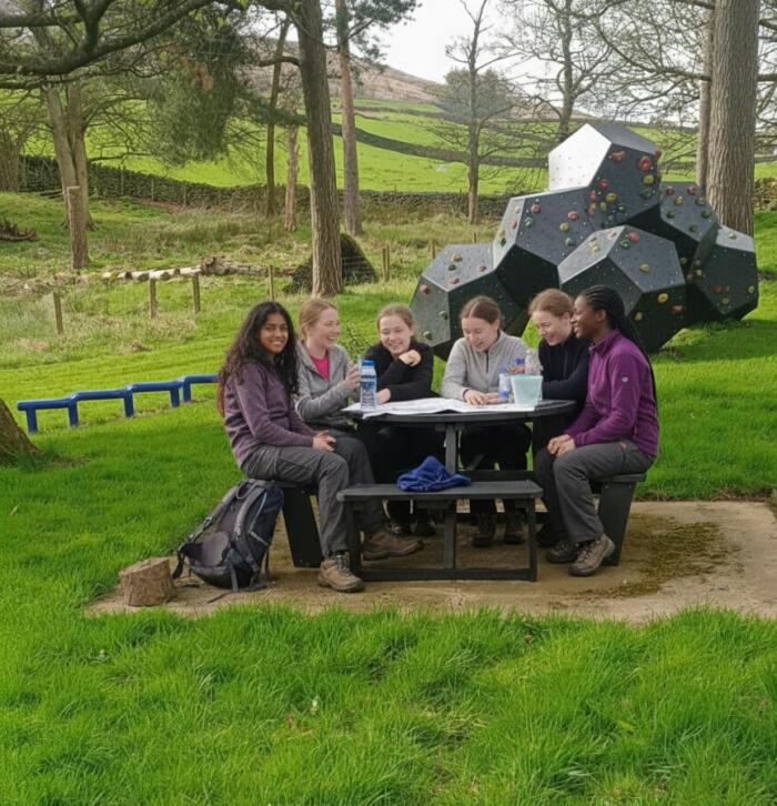 picnic-table-Calder-girls-adventure-recycled-plastic-picnic-table Girls gathered around a British Recyled Plastic Calder picnic table
