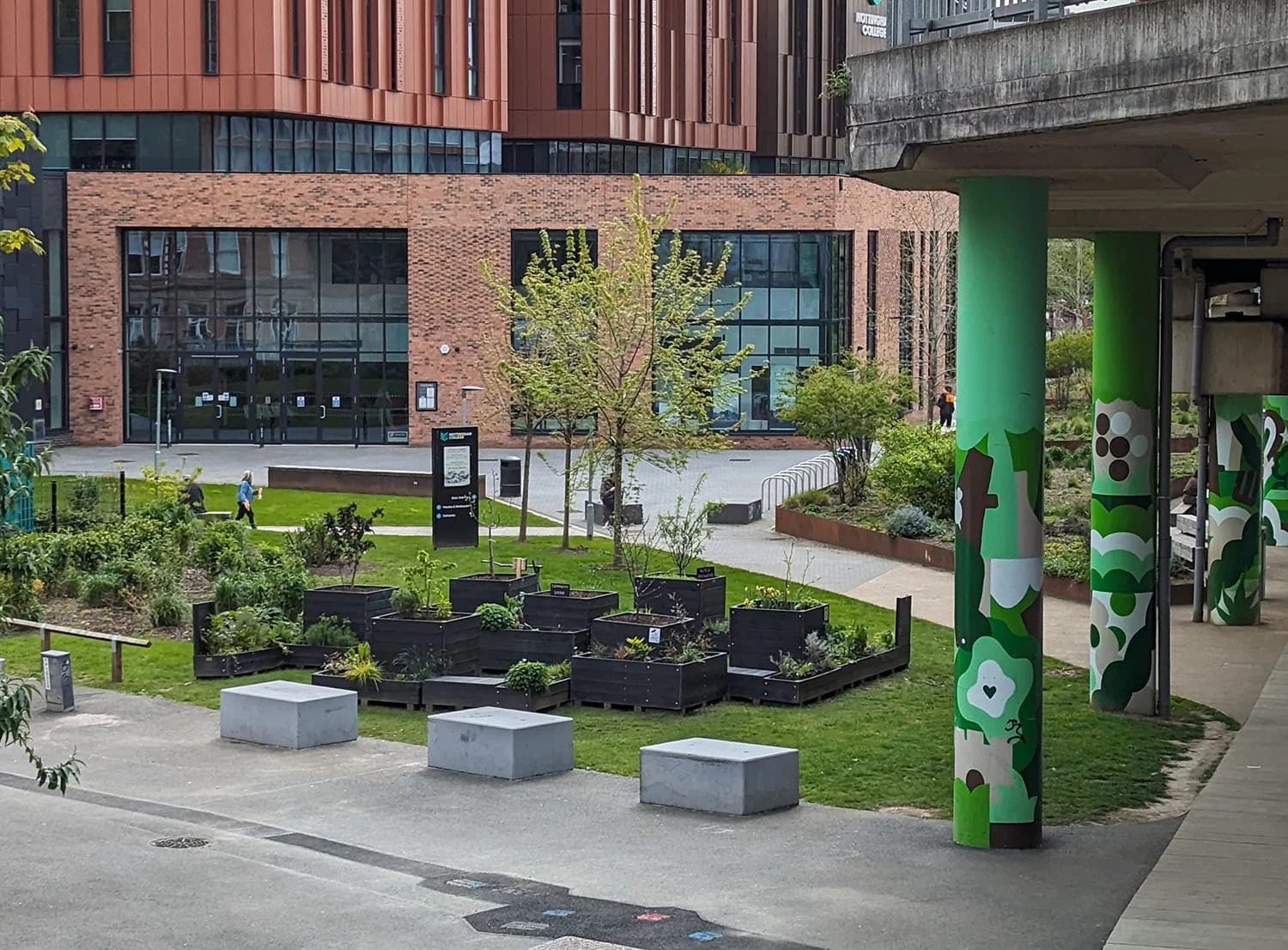 A parklet, custom built by British Recycled Plastic, in an urban setting.