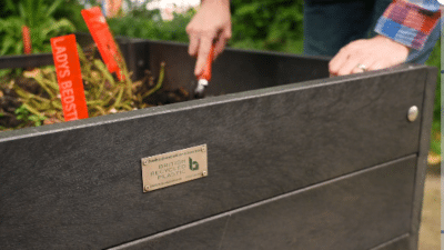 recycled plastic raised bed ith tag