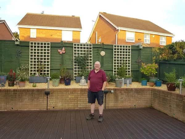 Customer-built recycled plastic decking replacing rotted timber