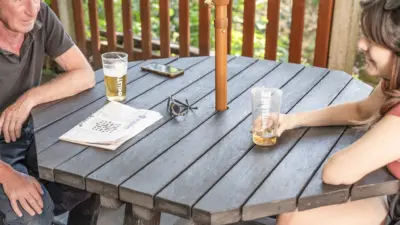 Close up of a Rishworth picnic table at a beautiful pub