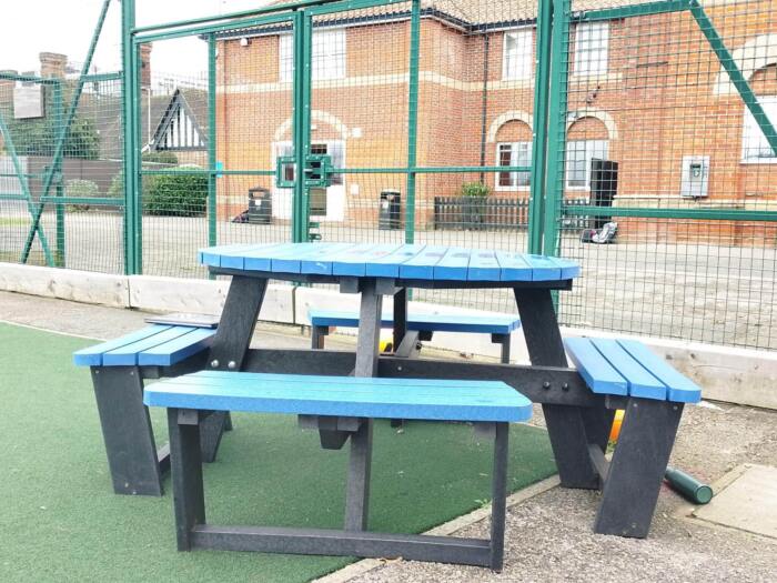 20240130_122150 (1) Blue recycled plastic picnis table in sunny play area