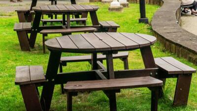 3 cbrown calder picnic table in a town centre park area