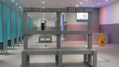 Changing room with benches and lockers. British Recycled Plastic