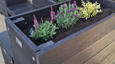 rectangular recycled plastic parklet with flowers